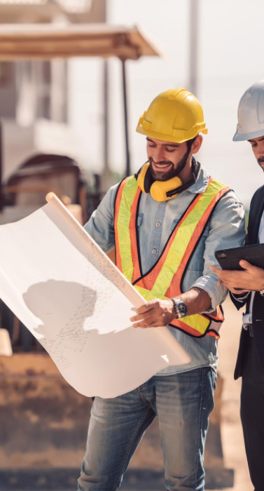 civil-engineer-construction-worker-manager-holding-digital-tablet-blueprints-talking-planing-about-construction-site-cooperation-teamwork-concept